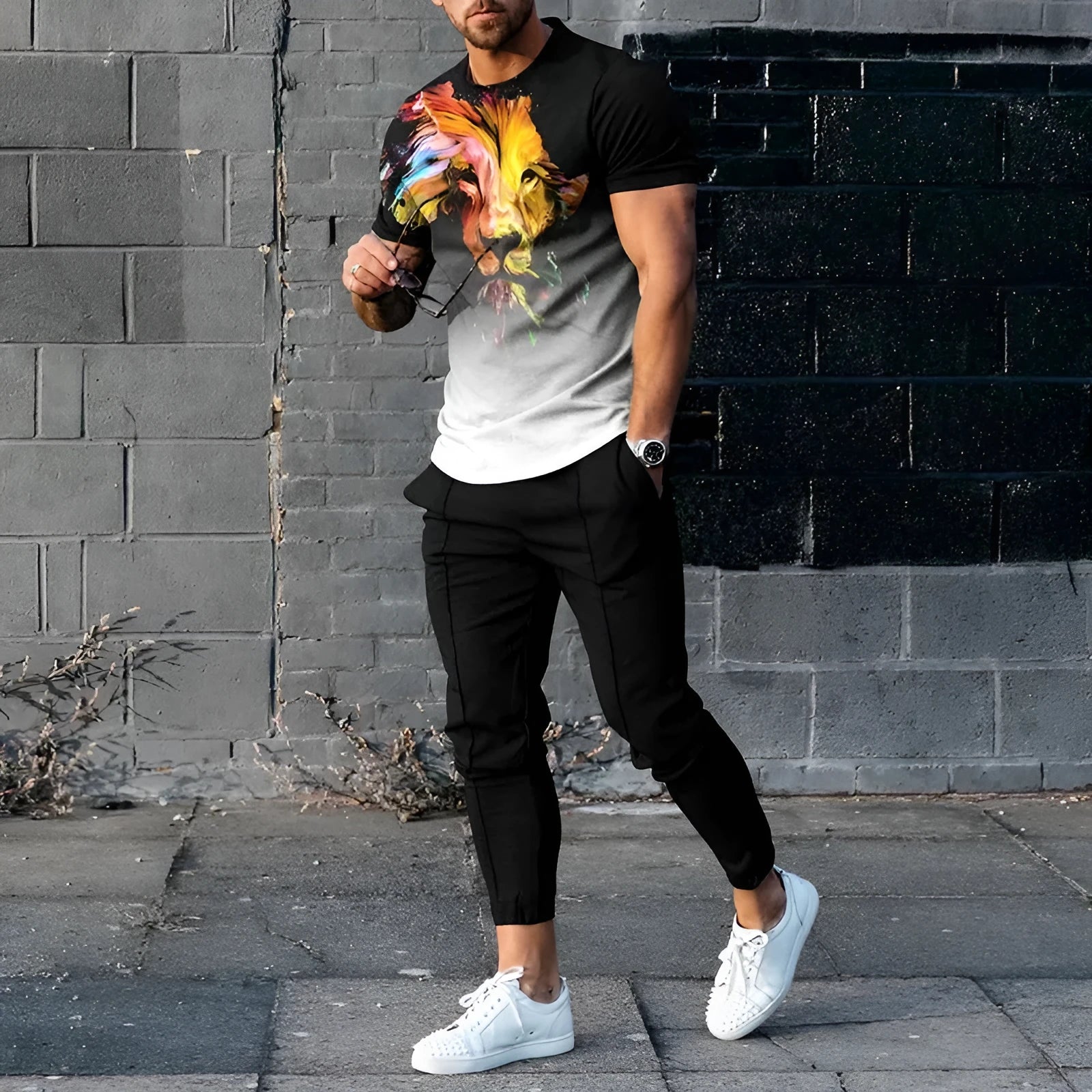 Men's slim-fit two-piece sports suit with short sleeve printed t-shirt and matching trousers in polyester blend fabric