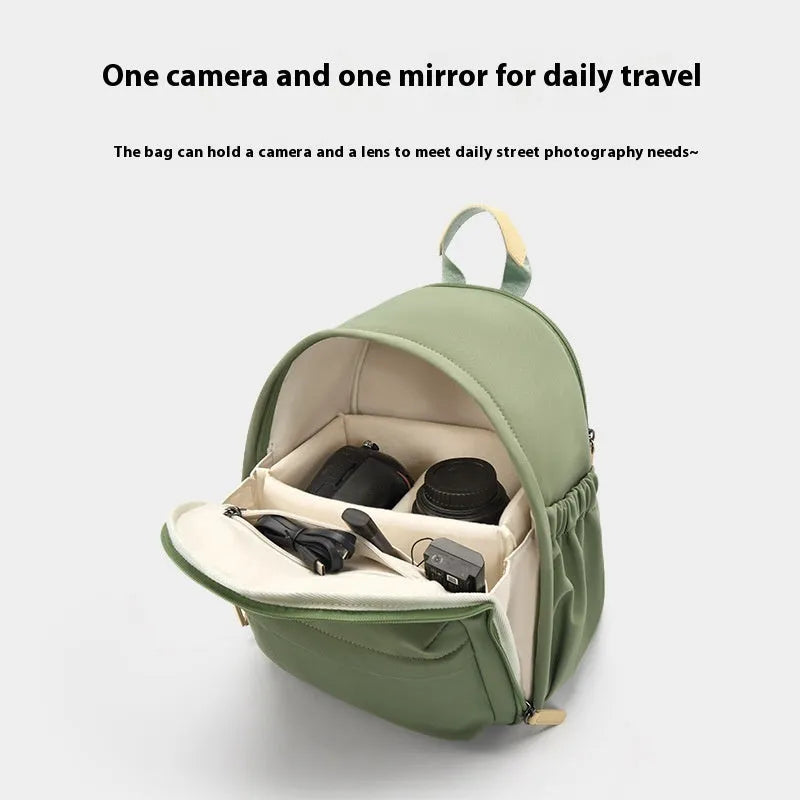 Solid colour shoulder camera bag for women with a detachable iPad compartment and a curve shoulder strap.