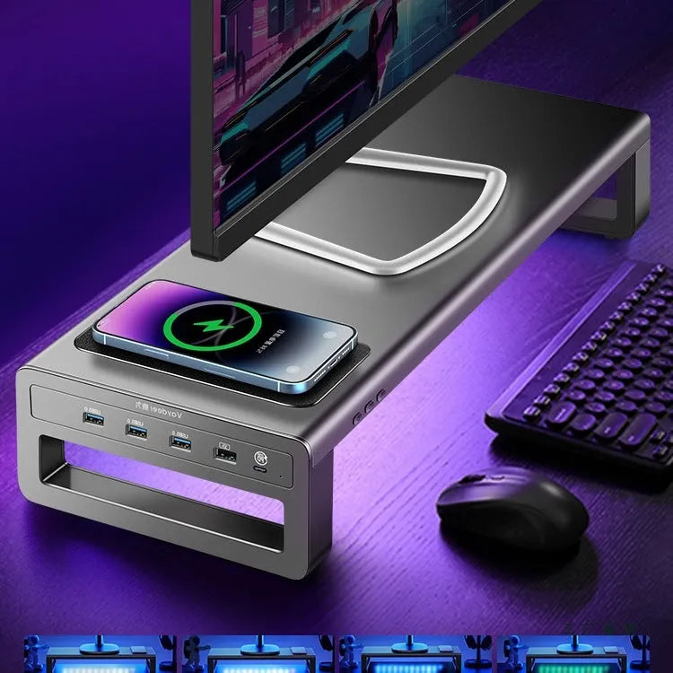 Desktop screen stand with drawer in black, featuring USB and wireless charging ports under monitor