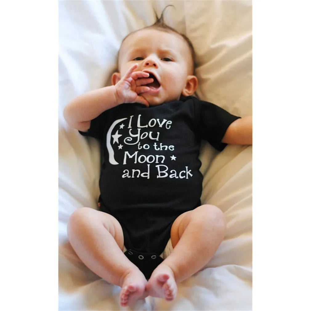 Black polyester baby romper with moon and star letter print, short sleeves, triangle climbing style, front view