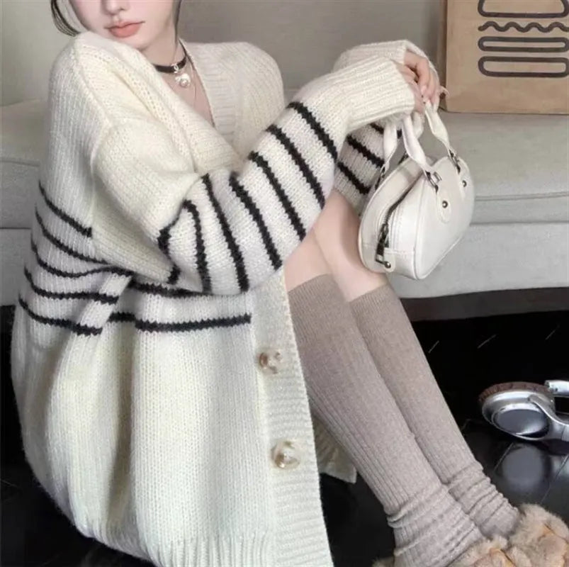 Collar button cardigan sweater with 3D pattern design in pictured colour