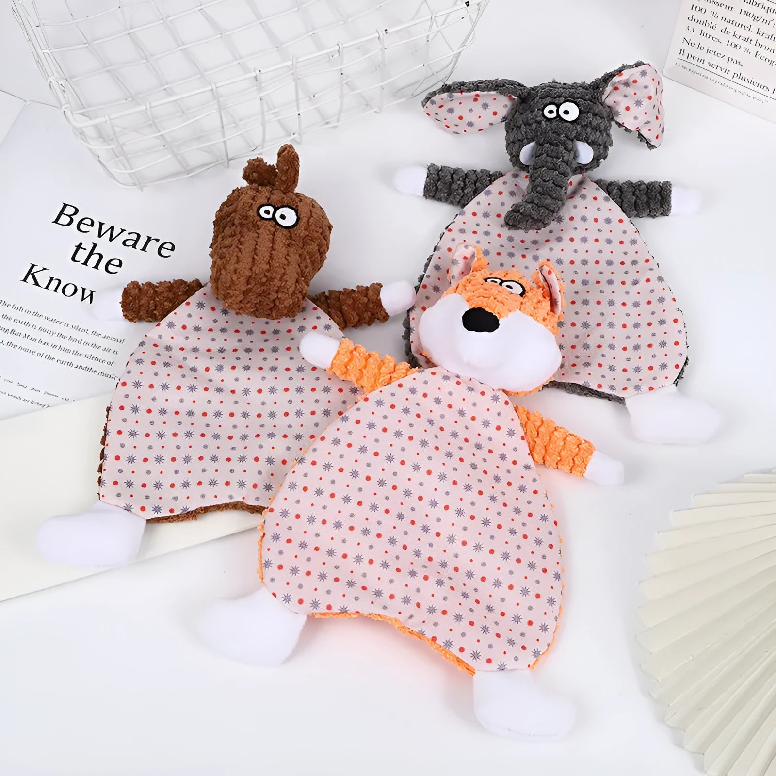 Brown velvet pet toy with fox and elephant designs containing sound paper for dogs and cats