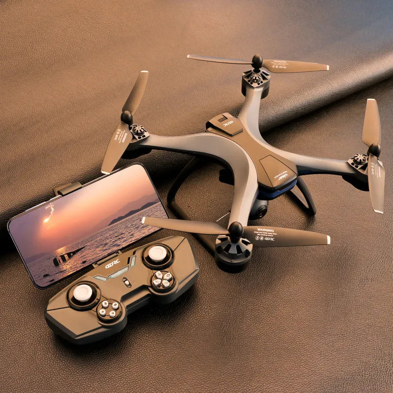 GPS quadrocopter drone with dual cameras, remote controller, spare blades, and landing gear on white background
