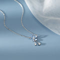 999 sterling silver flower pendant necklace with white nano anti-oxidation finish on adjustable cross chain