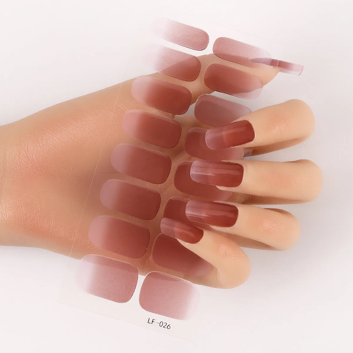 Set of 16 solid colour full nail art stickers showing patterns like cross, rose, tulip, and cartoon designs.