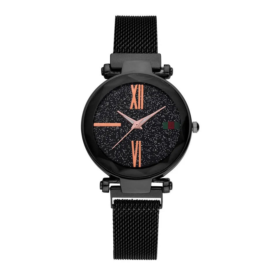 Ladies quartz wristwatch with round 32mm dial and stainless steel strap with magnetic buckle, shown in rose gold colour.