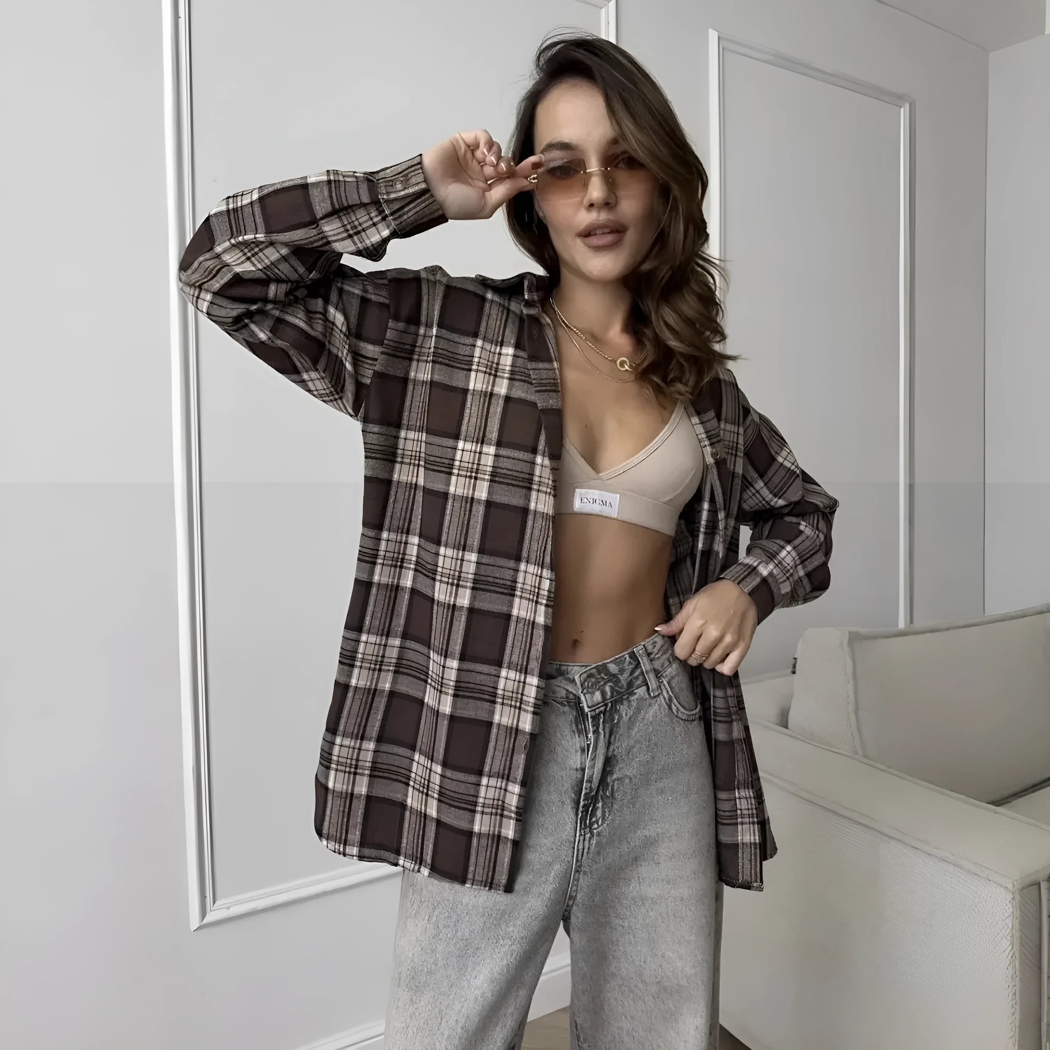 Dark brown striped retro women's shirt with long sleeves and collar styling