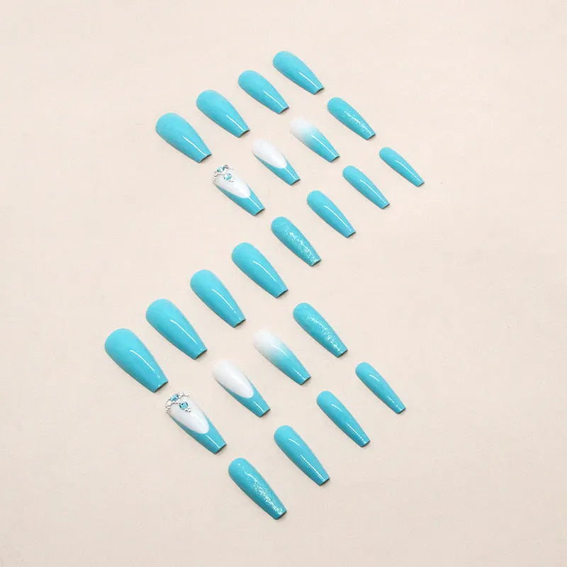 Blue false nails with diamond glitter accents in ballet shape, includes patches and glue