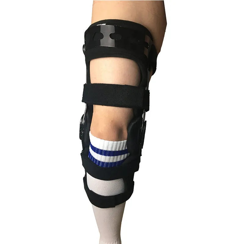 Black anterior ligament knee pad with iron-plastic skeleton construction shown in multiple sizes