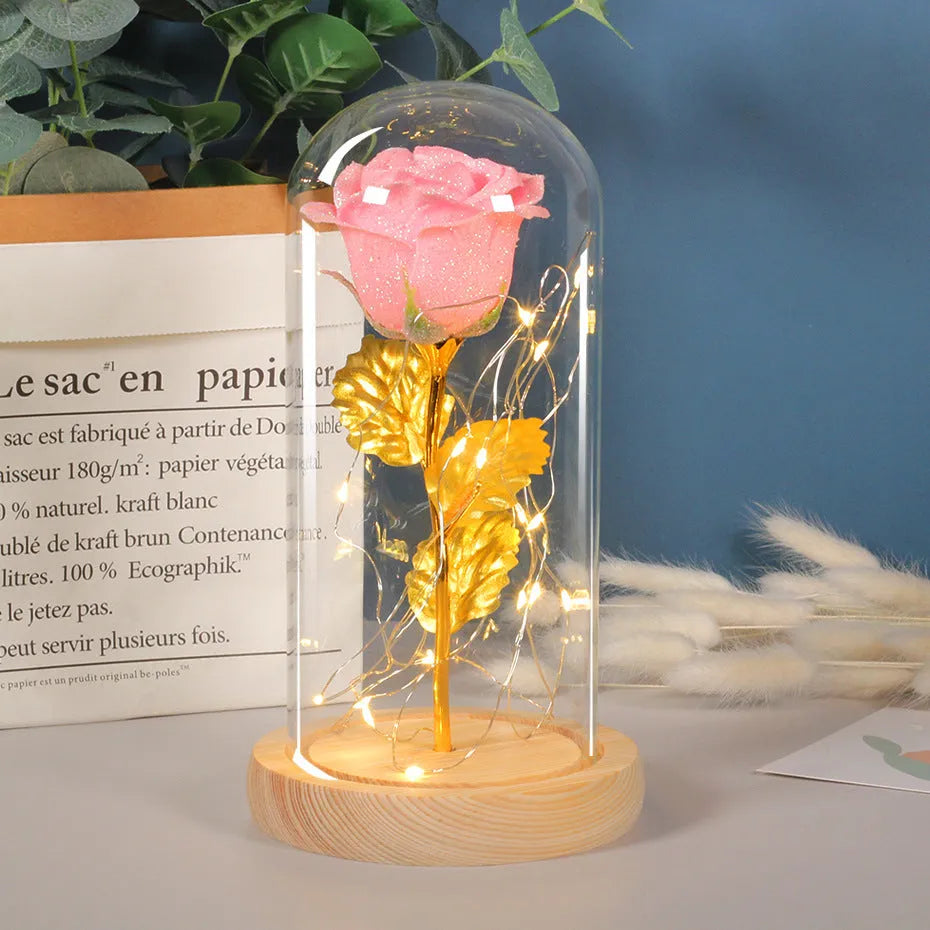 Eternal rose flower LED light in glass cover with warm white glow, six colours available, handmade
