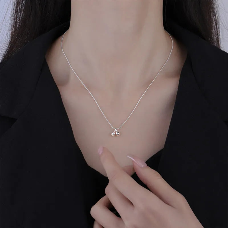Women's silver cherry necklace with adjustable snake bone chain and fruit pendant