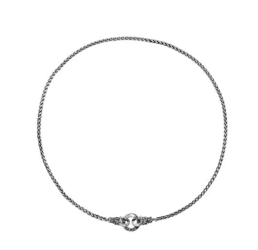 A sterling silver clavicle necklace for women with a minimalist pendant on a delicate chain.