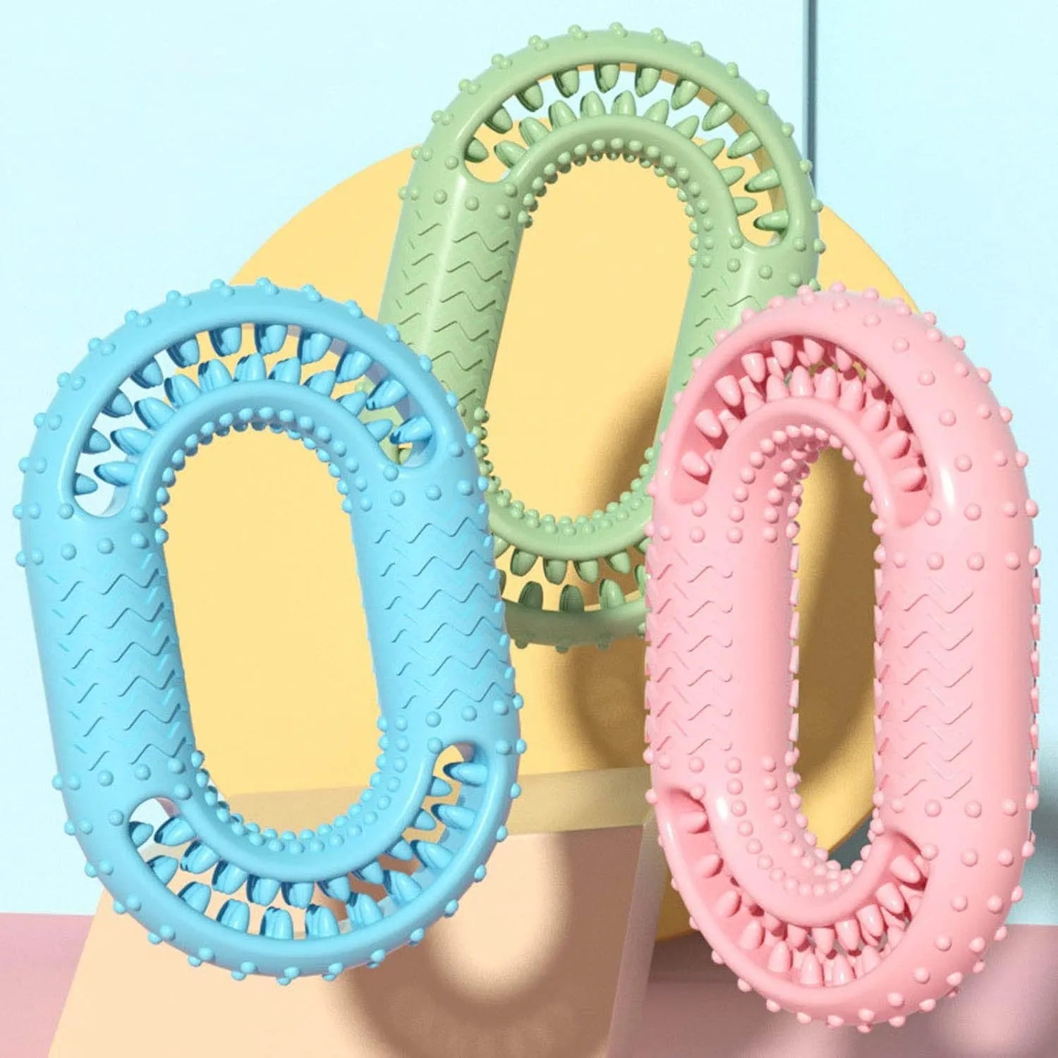 Blue O-ring shaped rubber dog chewing toy for aggressive chewers dental benefits