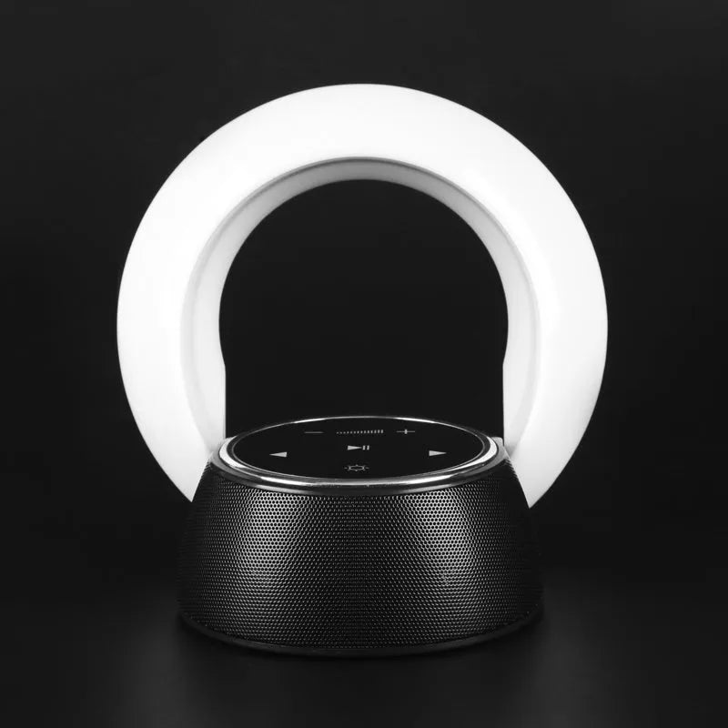 Blue cubic Bluetooth desk lamp with speaker and touch controls for dimming and colour selection