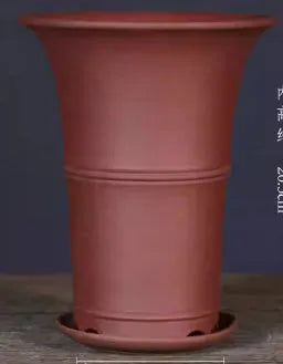 Large-diameter purple clay orchid pot in S1787 colour, placed on a tabletop, suitable for clivia and succulents