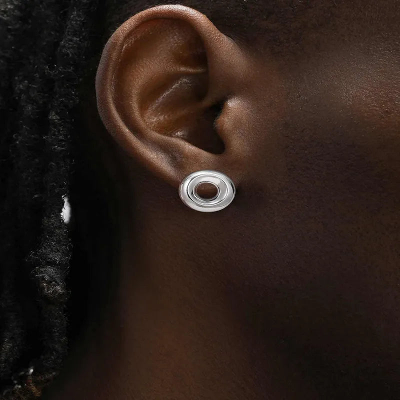 925 sterling silver O-ring earrings with 15mm diameter shiny finish on a neutral background