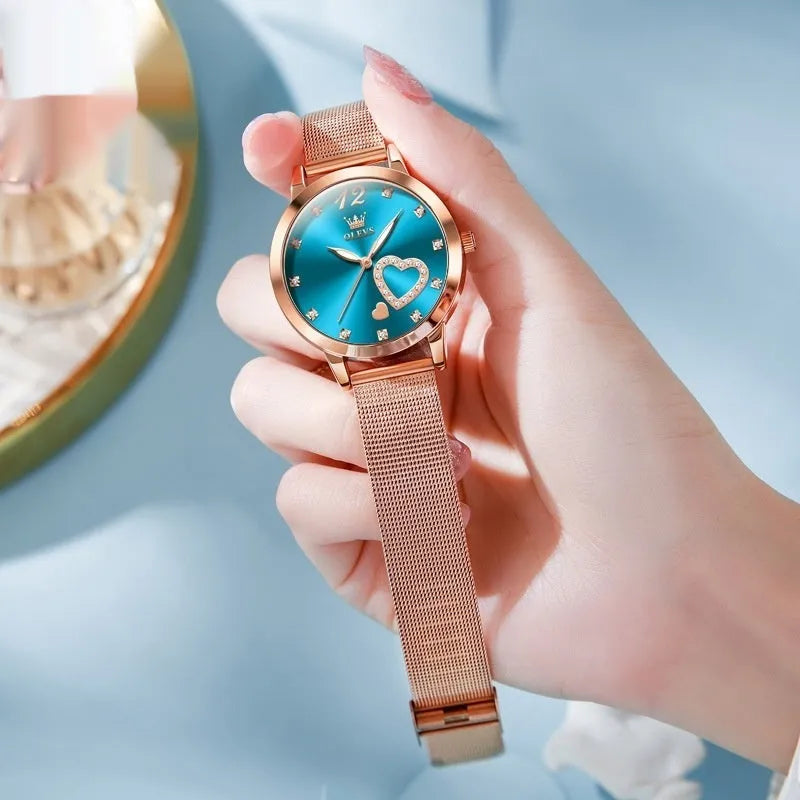 Women's fashion watch with rose alloy case and mesh strap in six dial colour options.