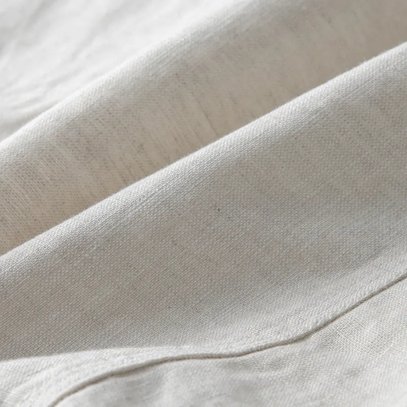 Men's loose fit linen casual suit jacket in solid colour, shown in available colours: white, black, natural linen, sky blue, navy blue.