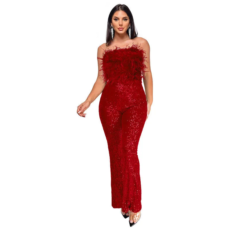 Women's sleeveless backless jumpsuit with flared legs in a champagne colour on a mannequin.