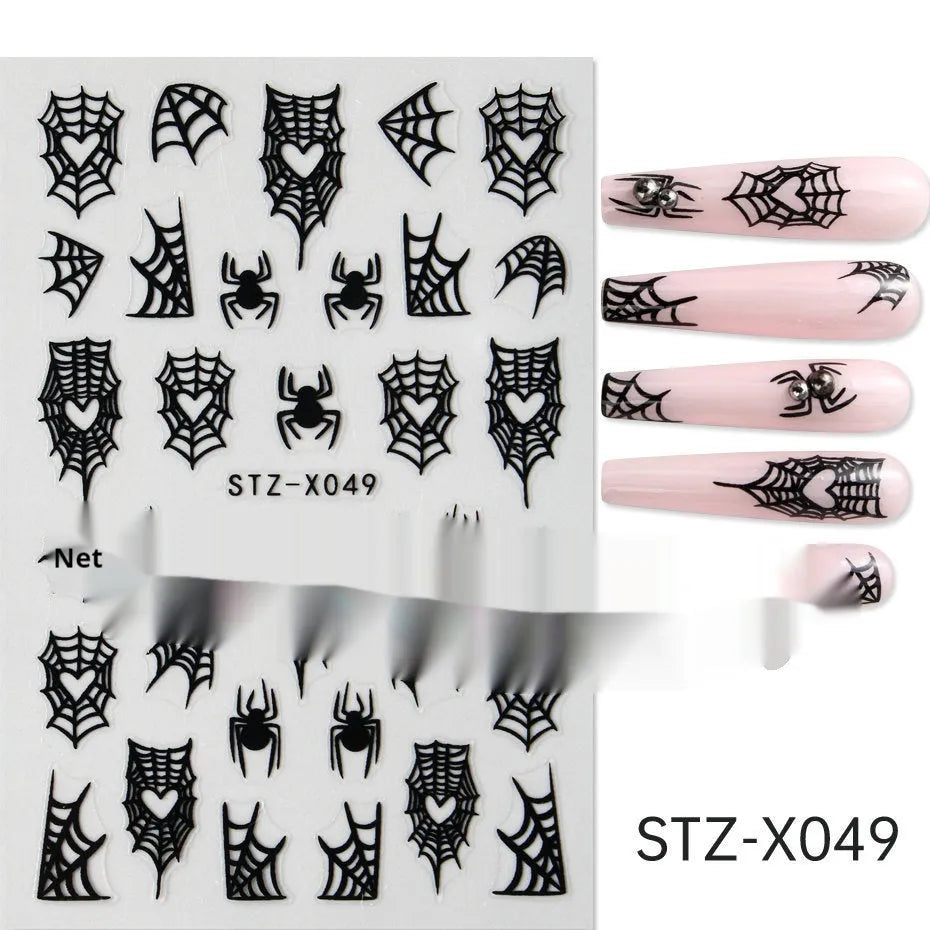 Sheet of black and silver strip nail art stickers with cartoon and love heart designs
