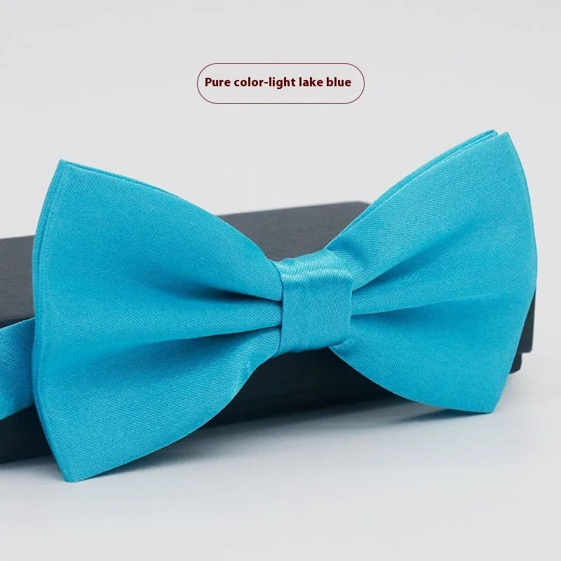 Solid colour polyester bow tie with flat head design measuring 12cm by 6cm
