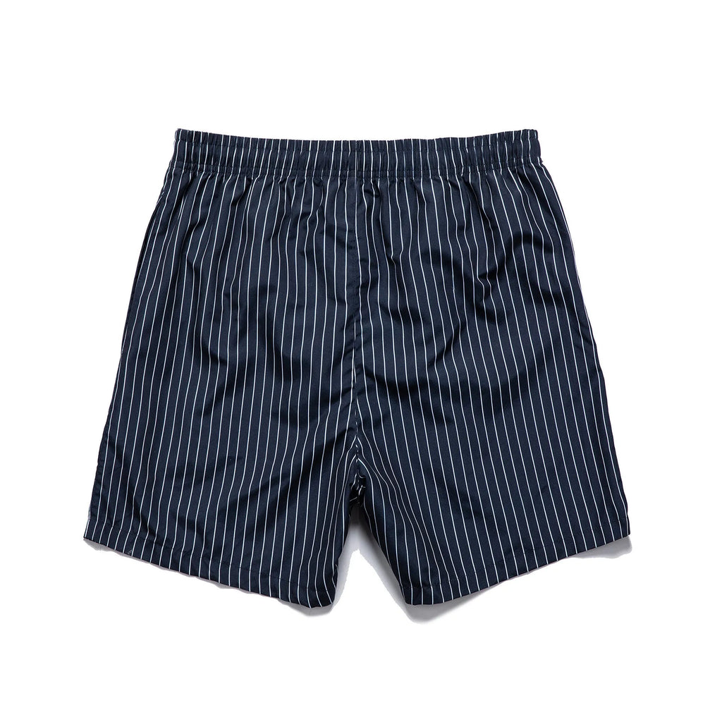 Men's striped beach shorts in navy blue, made from polyester fibre with a straight leg opening.