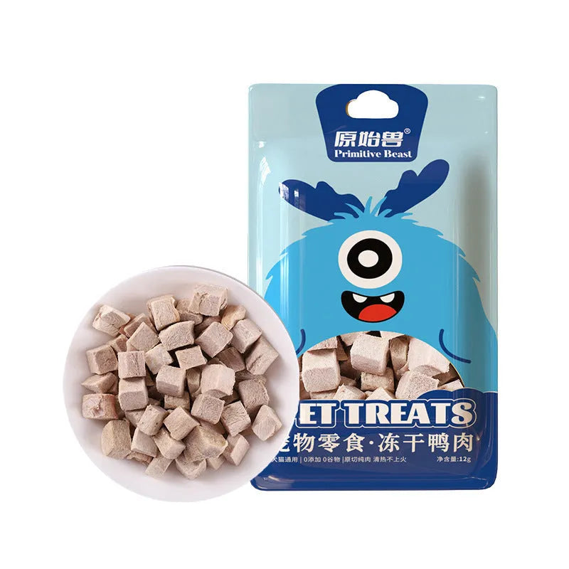 Assorted freeze-dried pet snacks including chicken, salmon, egg yolk, and rabbit blood in small resealable packs for dogs and cats