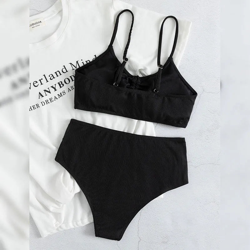 Black women's bikini swimsuit with sling split high waist shorts and sleeveless top
