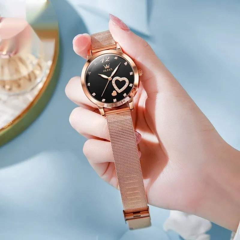 Women's fashion watch with rose alloy case and mesh strap in six dial colour options.