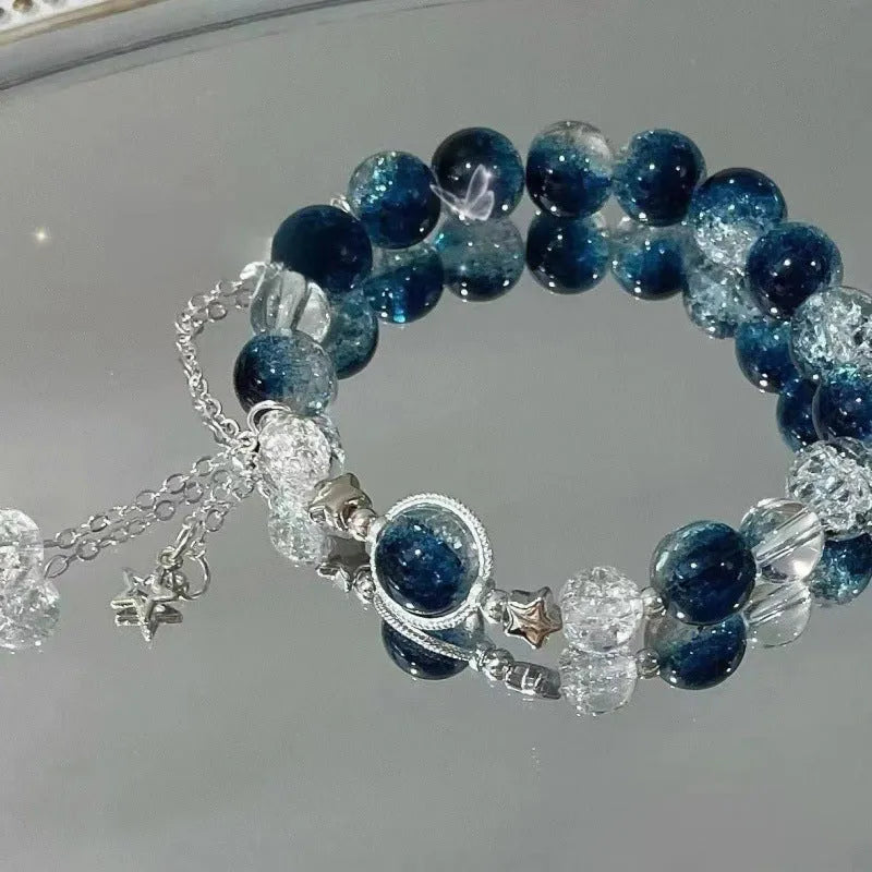 Chinese style glass bracelet with bamboo joint details in a red Lvzhu Duobao design.