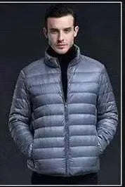 Men's lightweight down jacket in green plain cotton fabric with hood, short casual fit