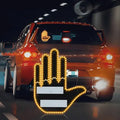 Black plastic car gesture light with LED illuminated hand gesture, remote control, and 3M Velcro mounting
