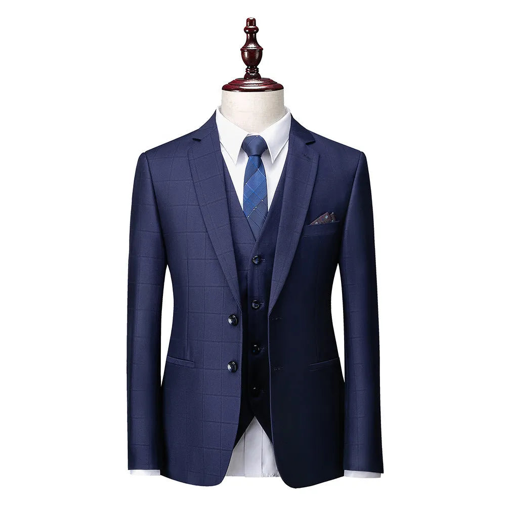 Men's navy blue plaid slim fit three-piece suit showing vest, jacket and trousers