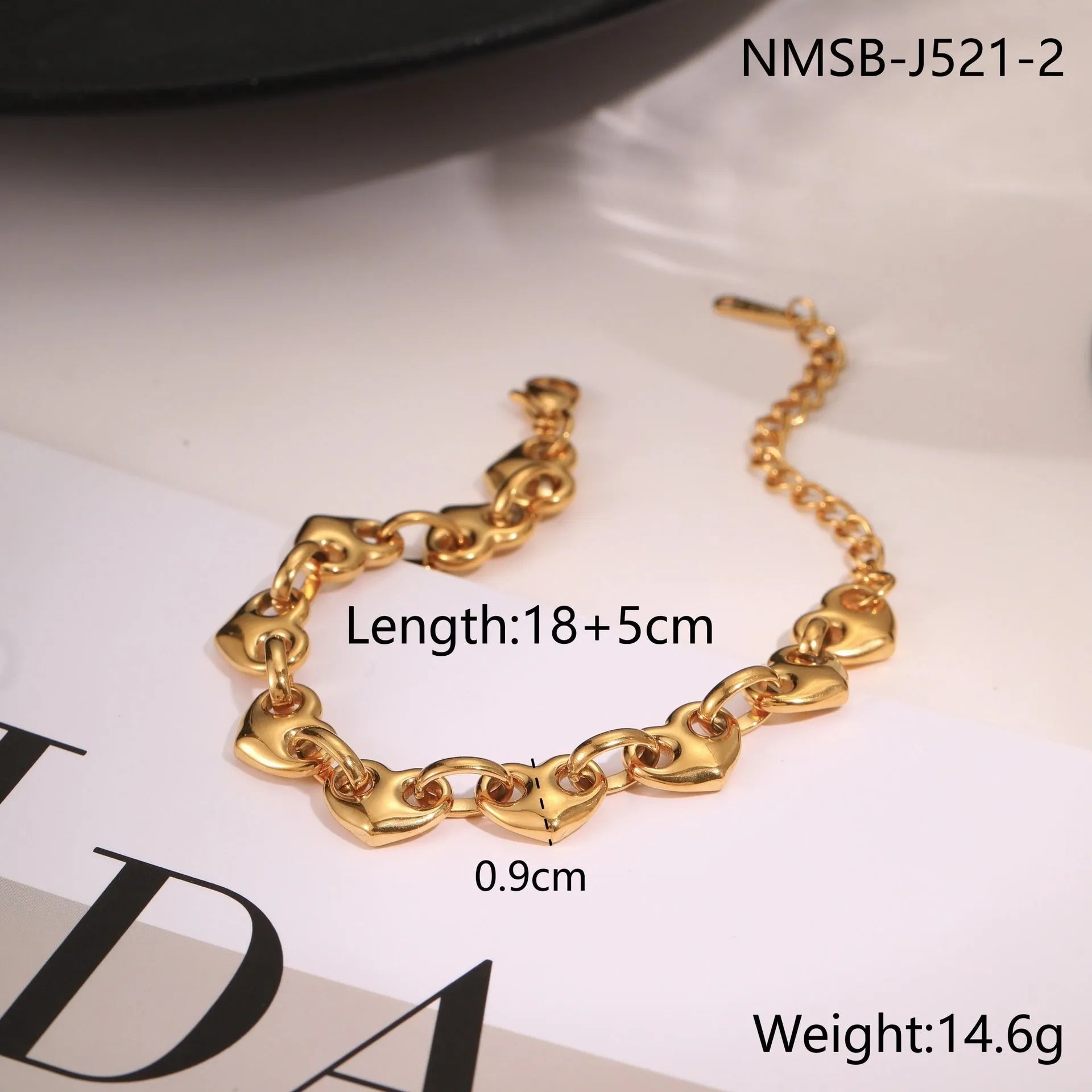 Women's hollowed-out geometric heart bracelet in gold or steel colour on stainless steel chain.