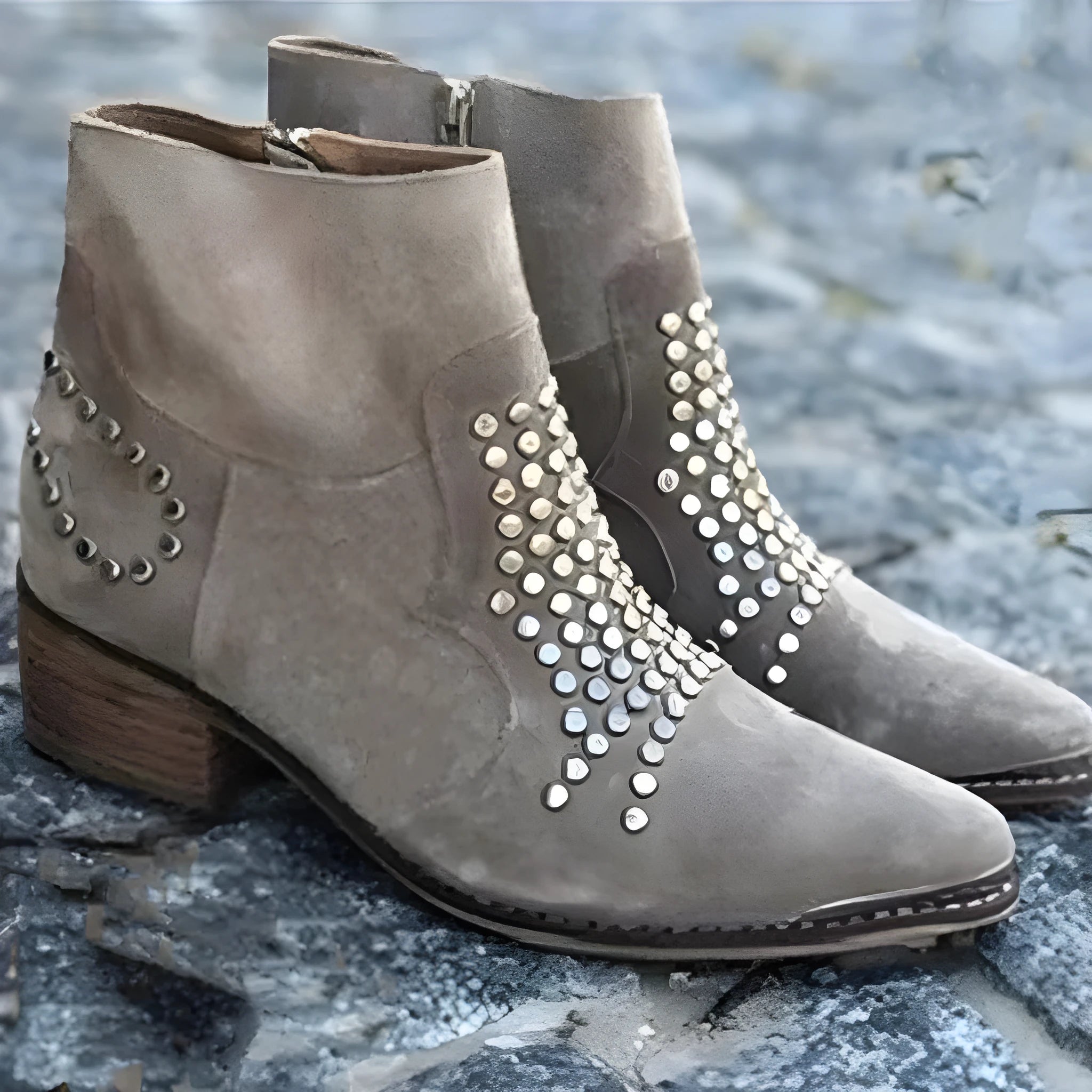Light grey women's sequined ankle boots with chunky heel, pointed toe, side zipper, and rhinestone accents
