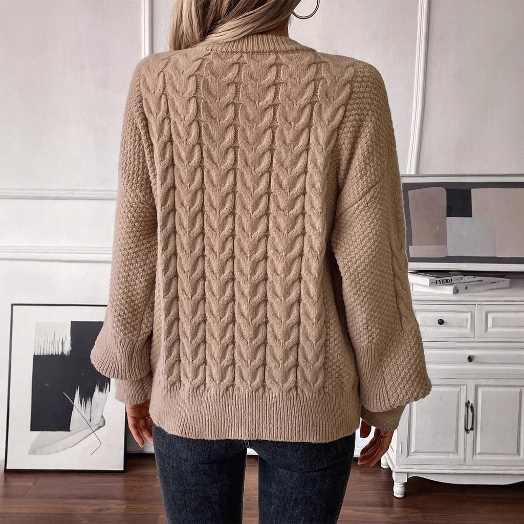 Women's loose fit round neck casual sweater in khaki colour with twist thread design detail.