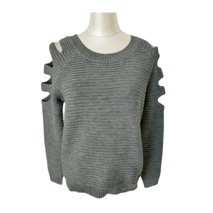 Women's solid colour knitted shirt with crocheted hollow-out long sleeves and round neck.