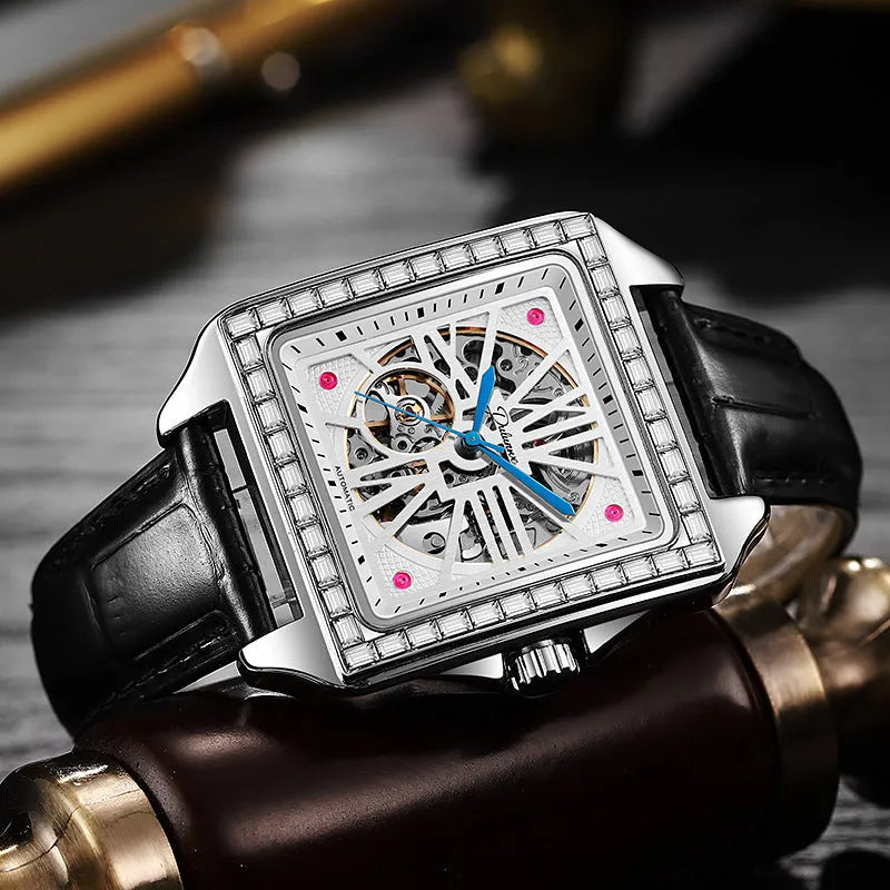 Men's square automatic watch with diamond-studded bezel on black leather strap
