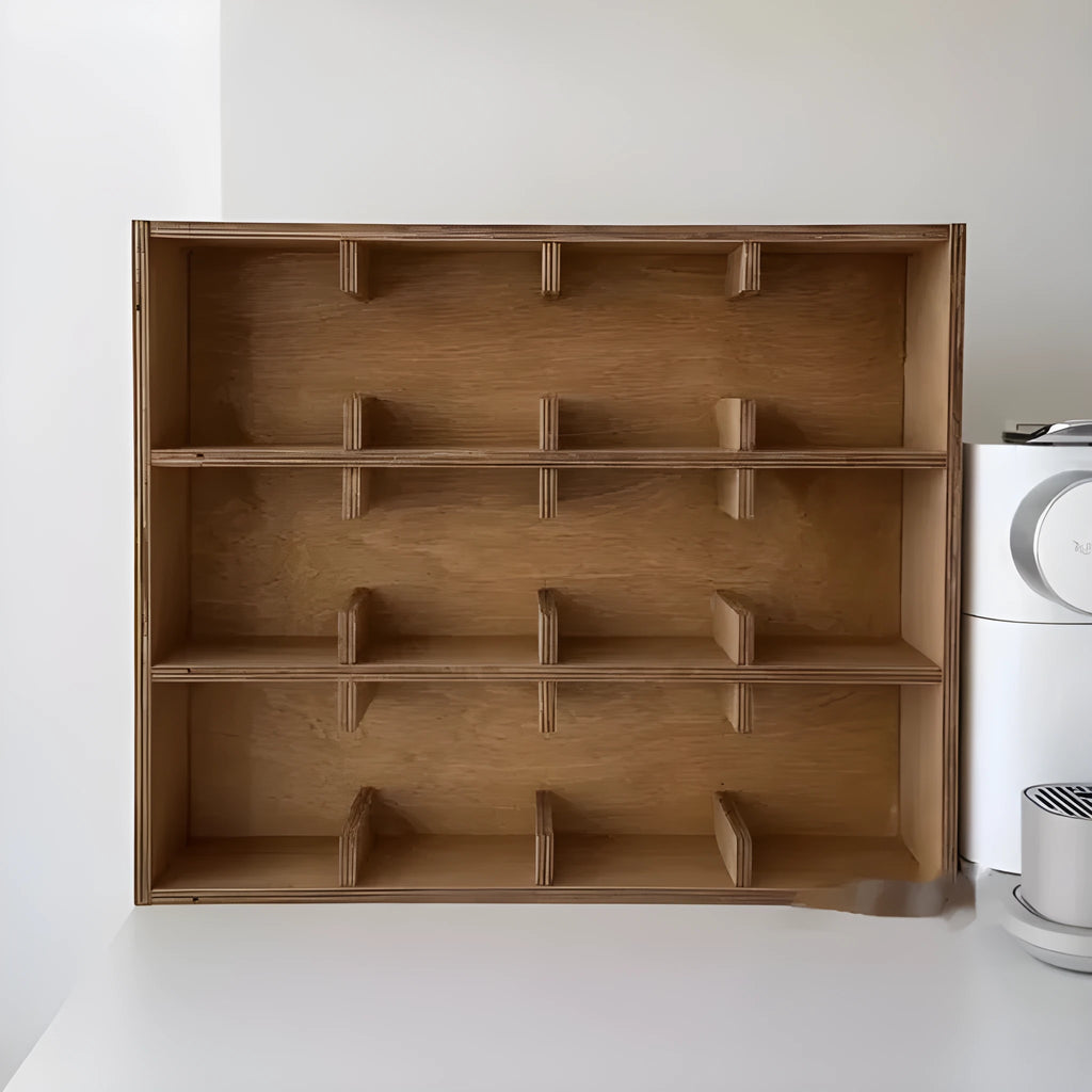 Square birch wood cup storage rack with multiple grid compartments for organising drinkware.