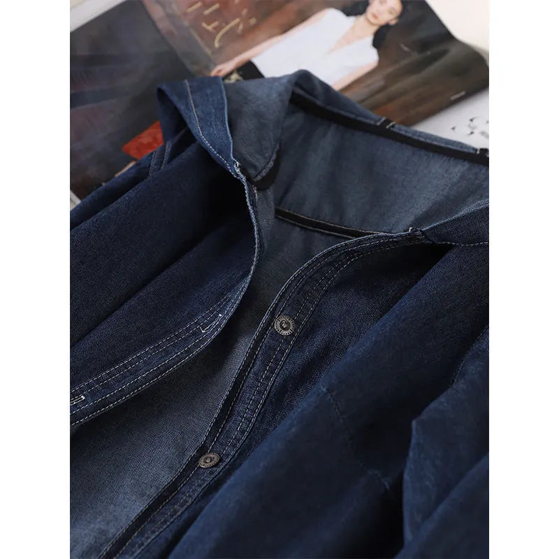 Solid colour hooded denim top in denim blue with large front pocket and long sleeves