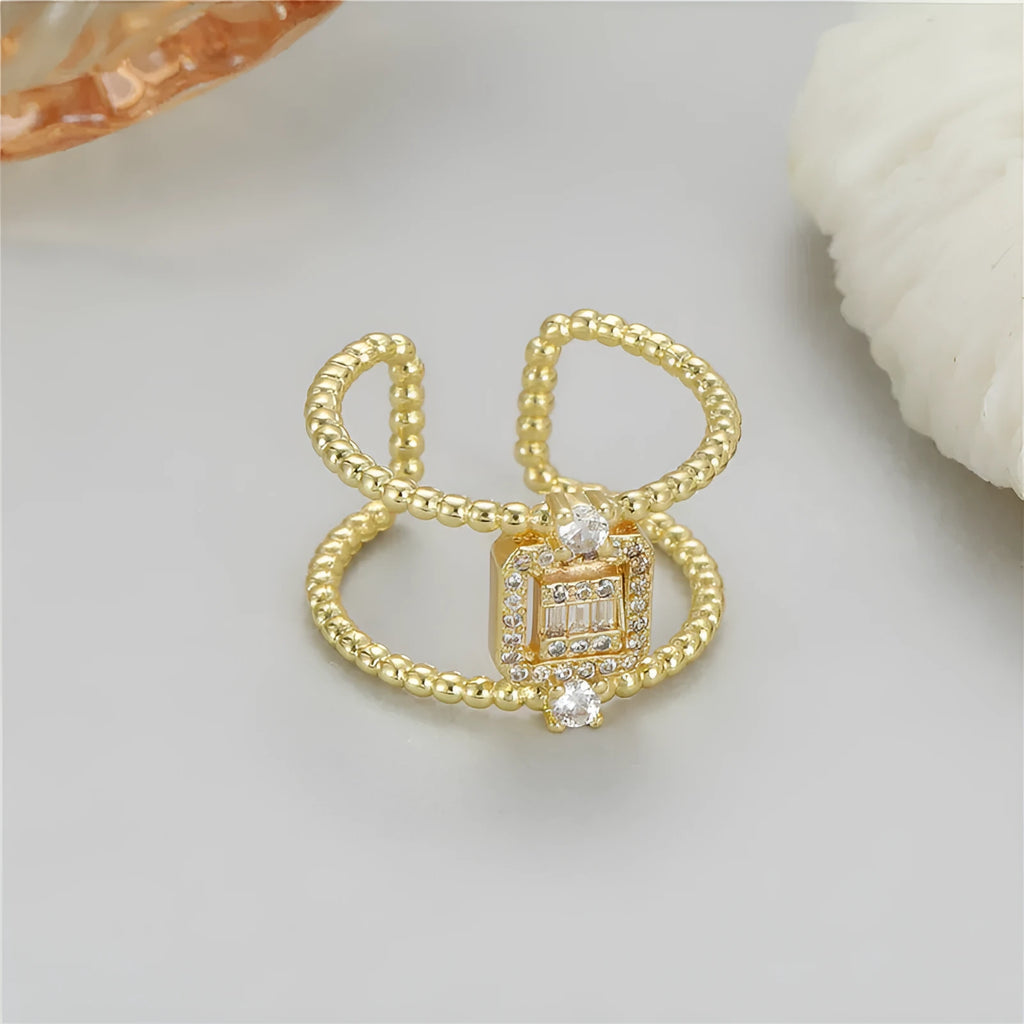 Gold open ring with asymmetric U-shaped design and adjustable opening