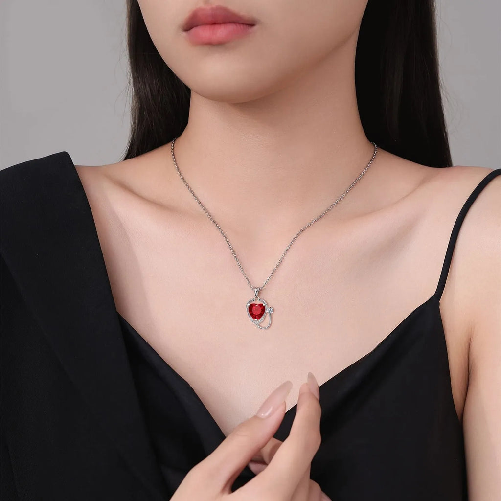 Red diamond women's stethoscope necklace with fashion wings cross design on copper with electroplated finish