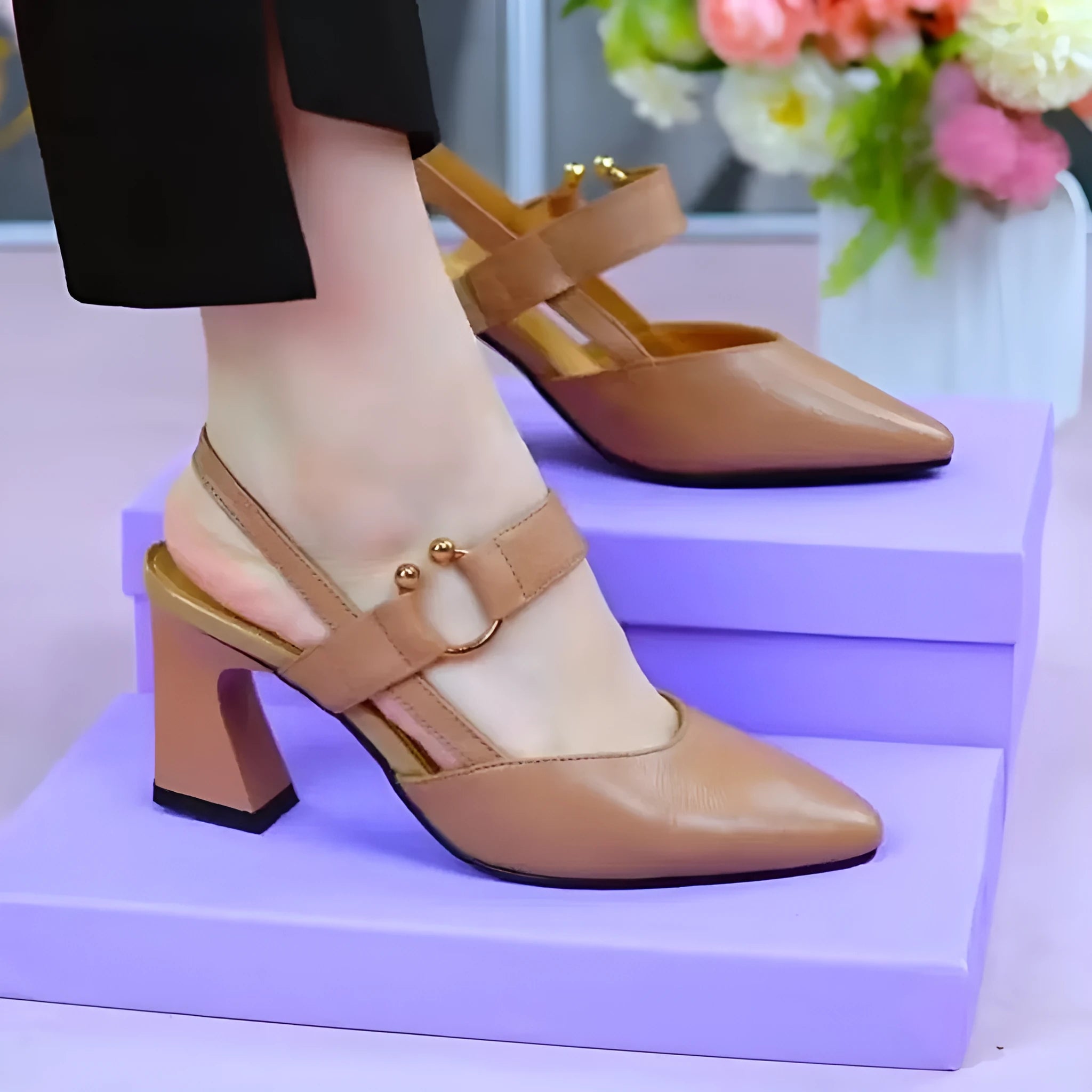 Women's apricot coloured leather sandals with a closed toe, chunky high heel, and rubber sole.