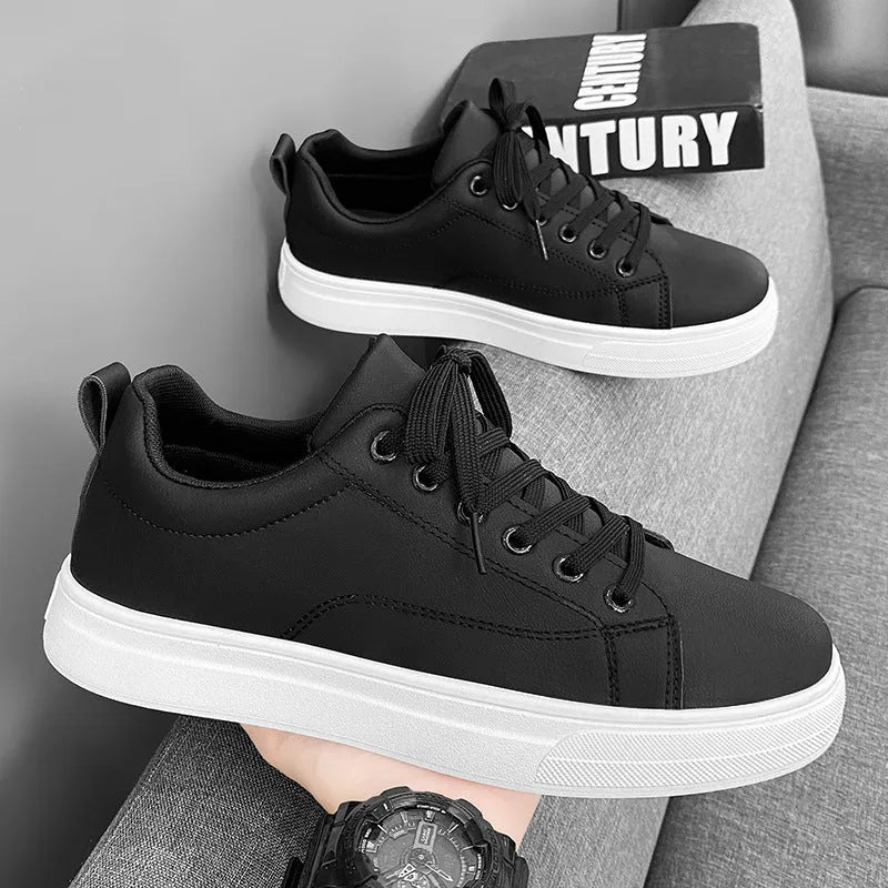 Men's low-top Korean-style sneakers in black, white, and black with white sole colour options.