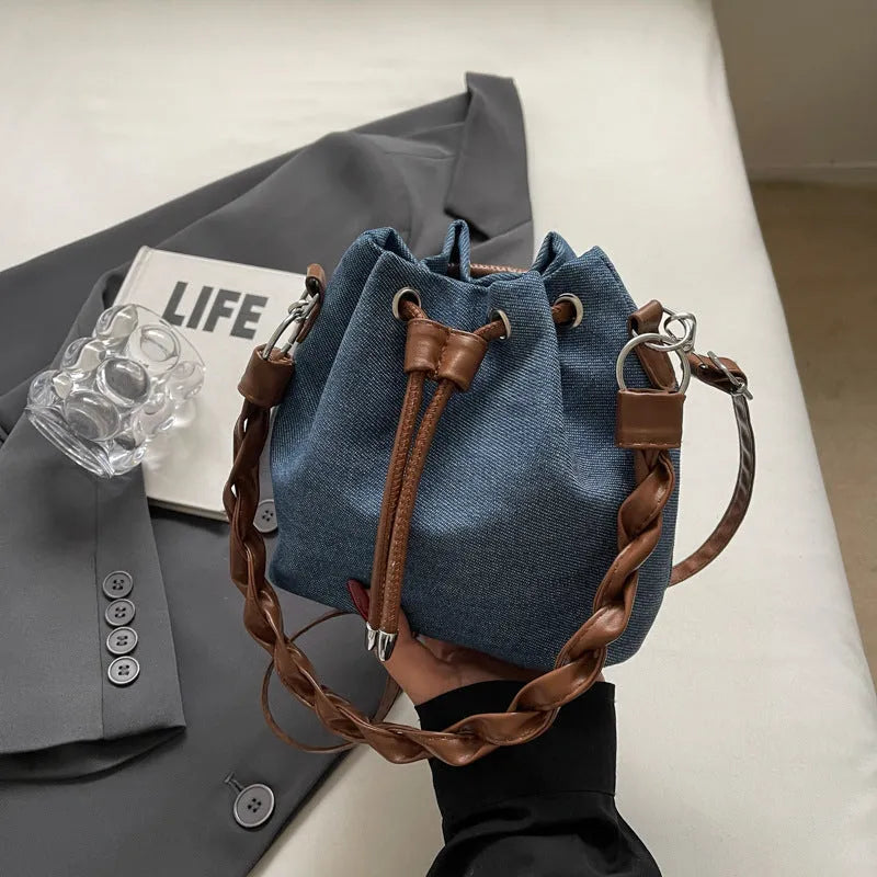 Blue synthetic leather one-shoulder cross-body bucket bag with optional hanging ornaments