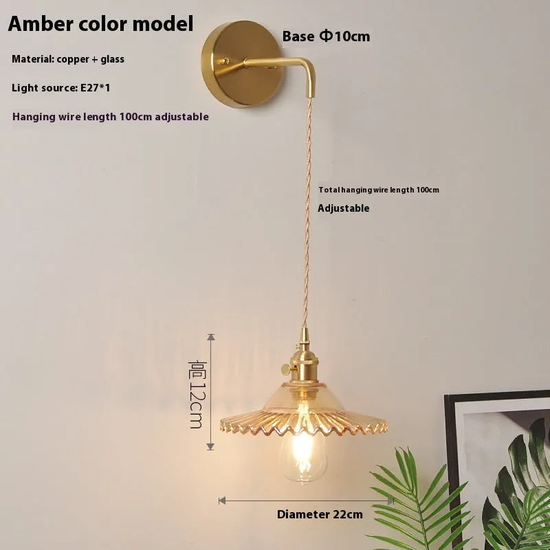 Retro copper lotus wall lamp with glass shade in choice of six colours, suspended from a wall