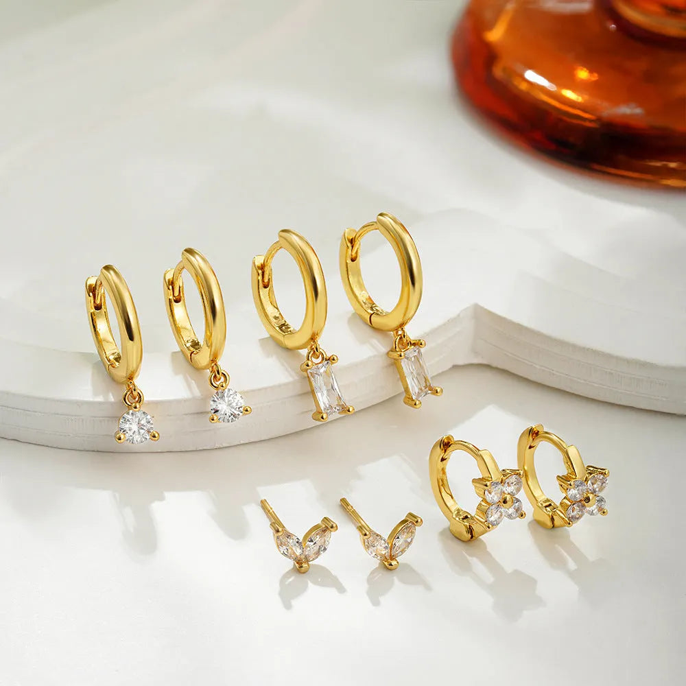 Copper electroplated geometric earrings set showing star, ellipse, ring and quadrilateral designs in gold or silver finish