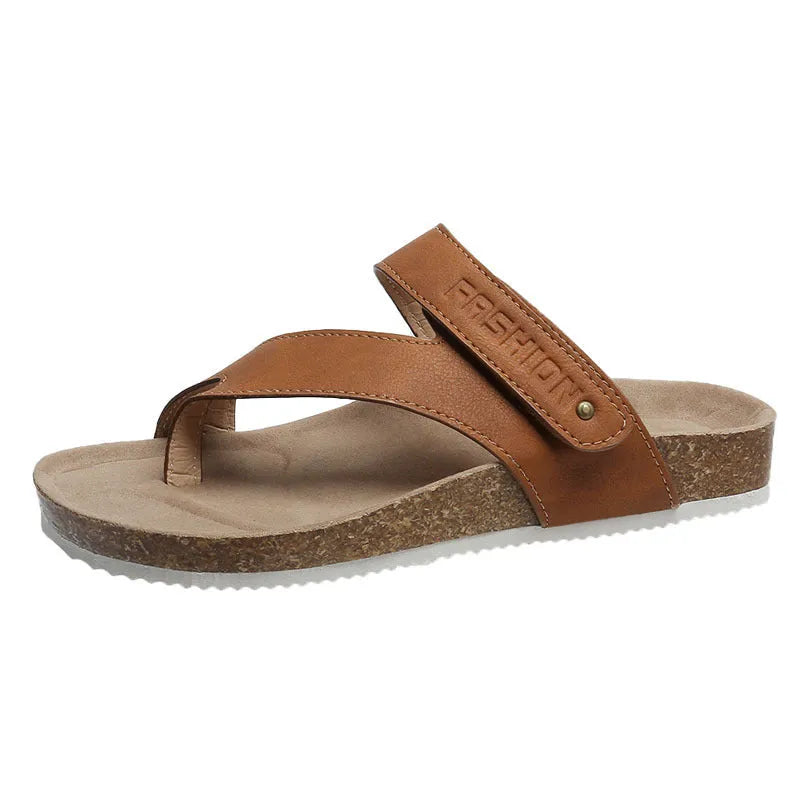 Flat toe ring thick-soled flip-flop in a solid colour on a plain background