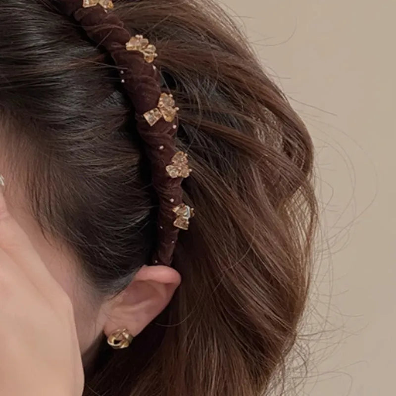 Velvet-lined hairband with crystal wave pressing design in multiple colour options