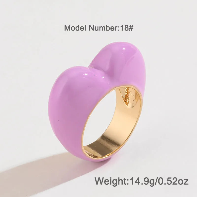 Heart-shaped three-dimensional enamel ring in zinc alloy showing raised colourful design